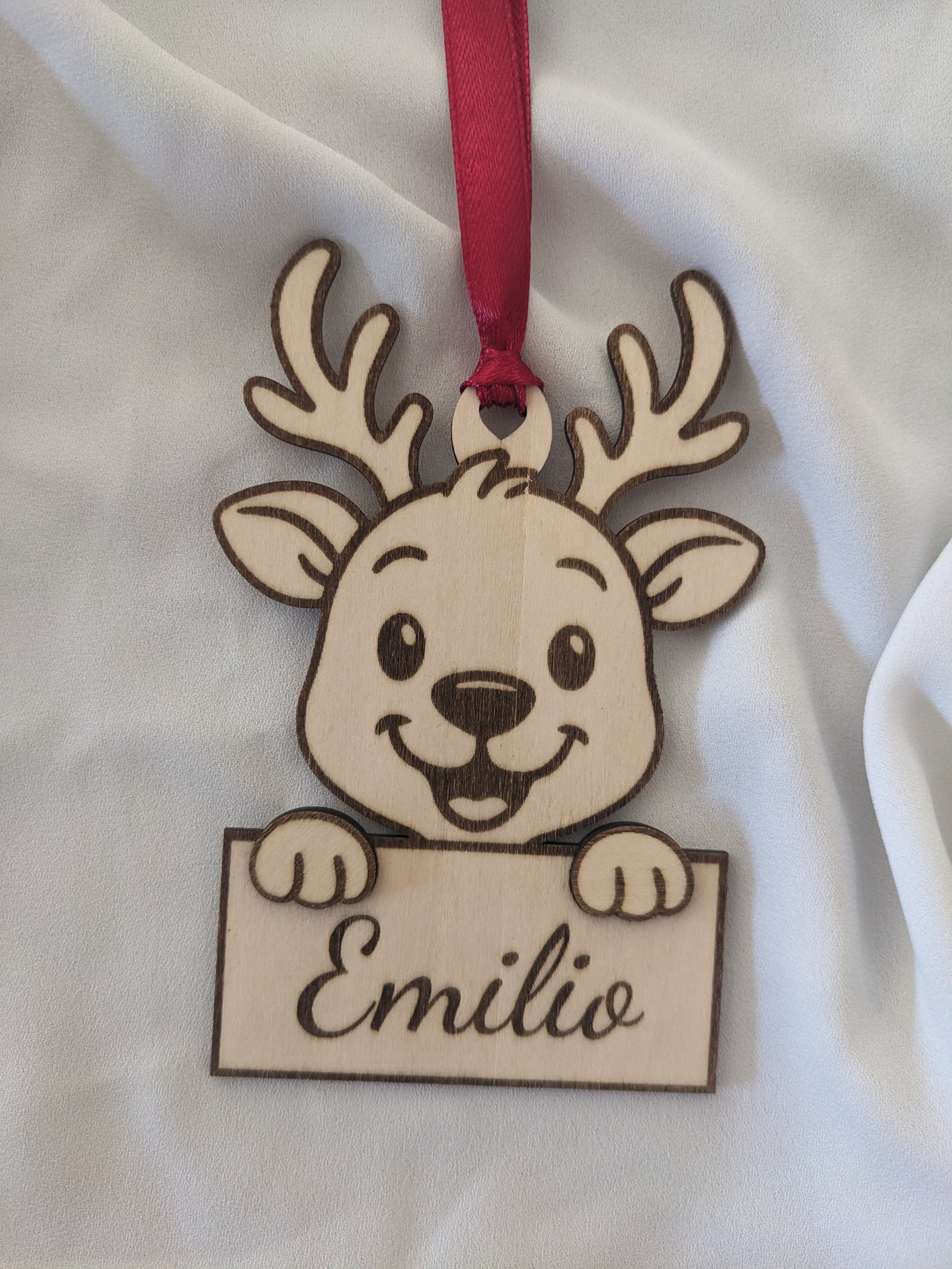 Petit renne de Noël tenant pancarte prénom